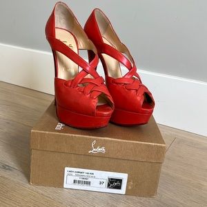 Christian Louboutin size 37 in mandarin red